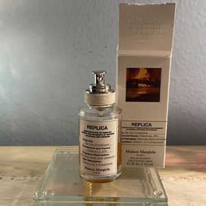 SOLD By the fireplace 30ml. About .5 oz left